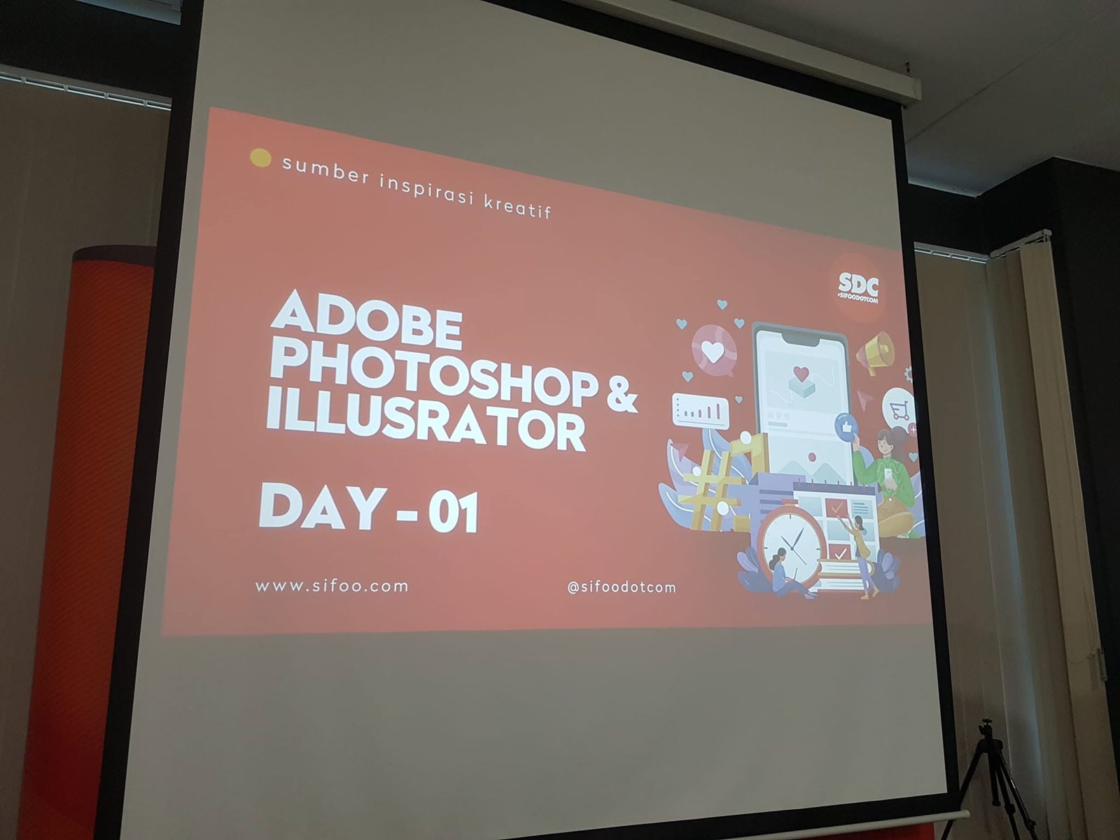 Projector screen showing the title slide Adobe Photoshop and Illustrator, Day 01