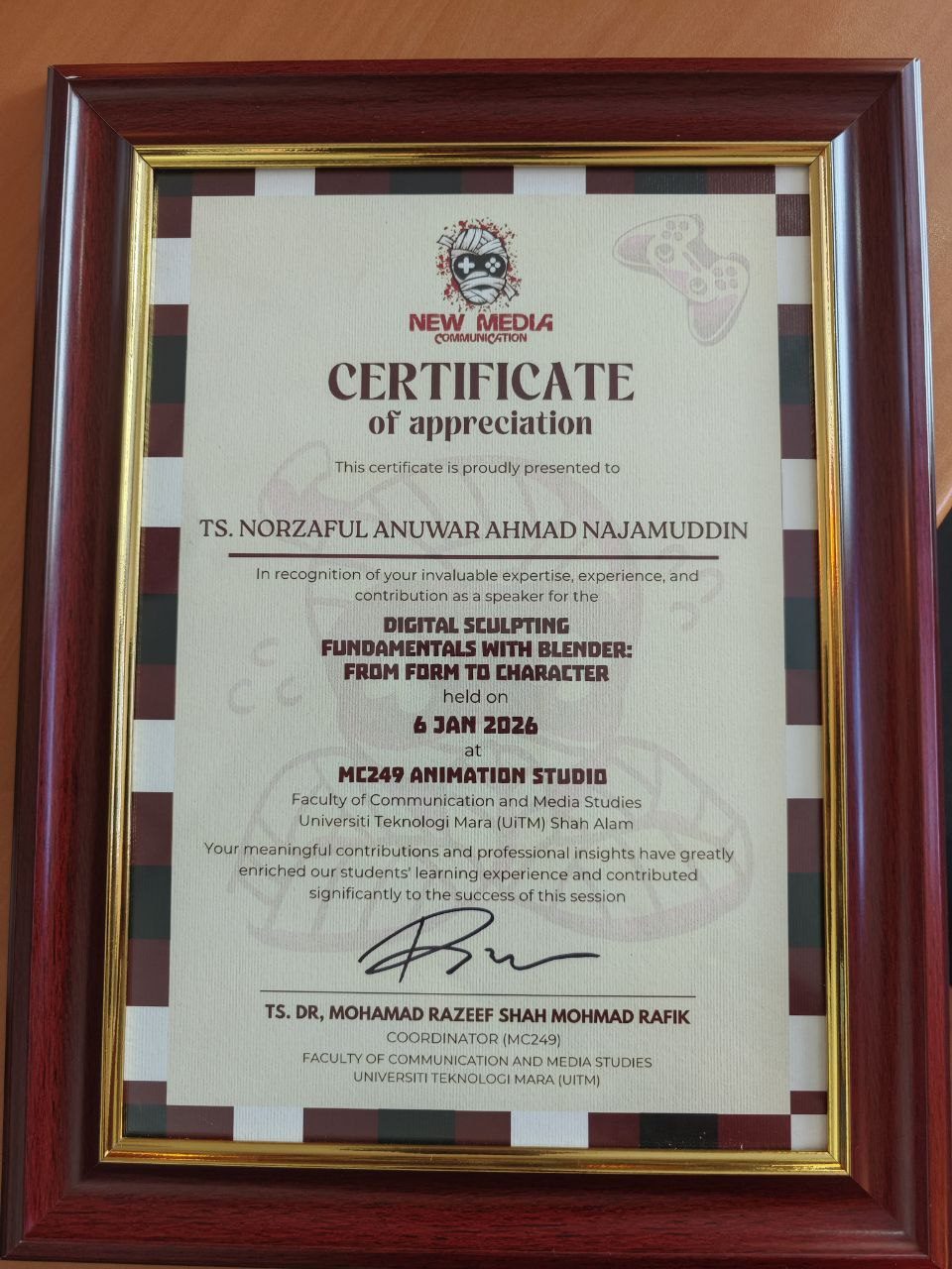 Framed certificate of appreciation for speaking at the workshop