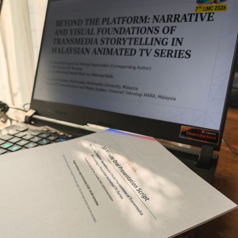 Title slide on laptop with printed presentation script
