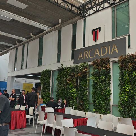 Arcadia building with green wall and conference tables